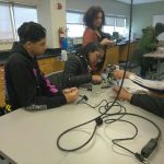 Students working on pulse oximeters int he CCP labs in the BMET program